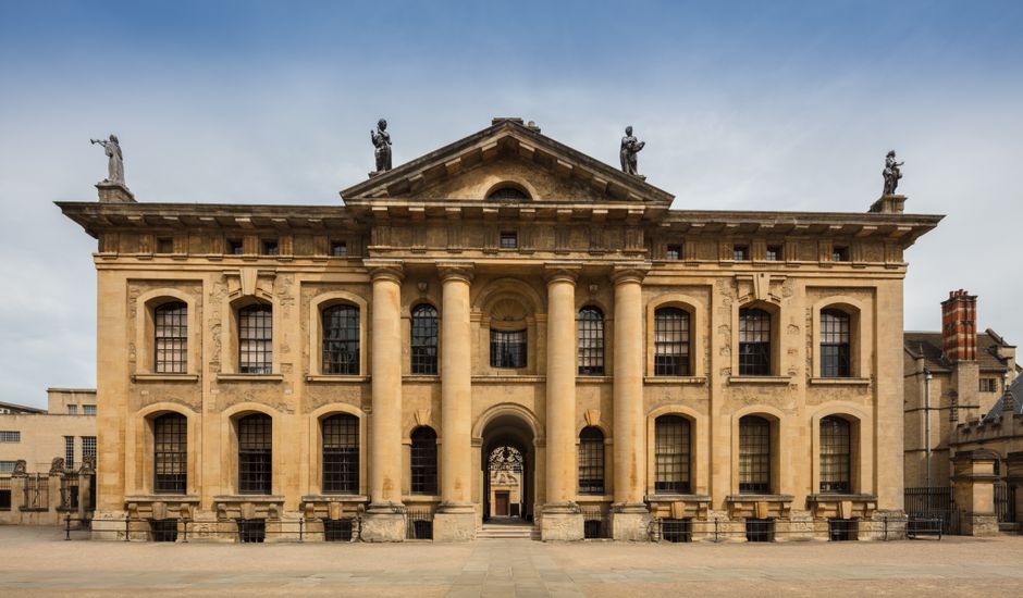 Front view of the Clarendon Building, a historic landmark at Oxford University.