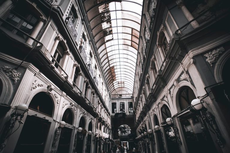 A striking view of a historic glass-roofed arcade in Istanbul, Turkey, showcasing intricate architecture.
