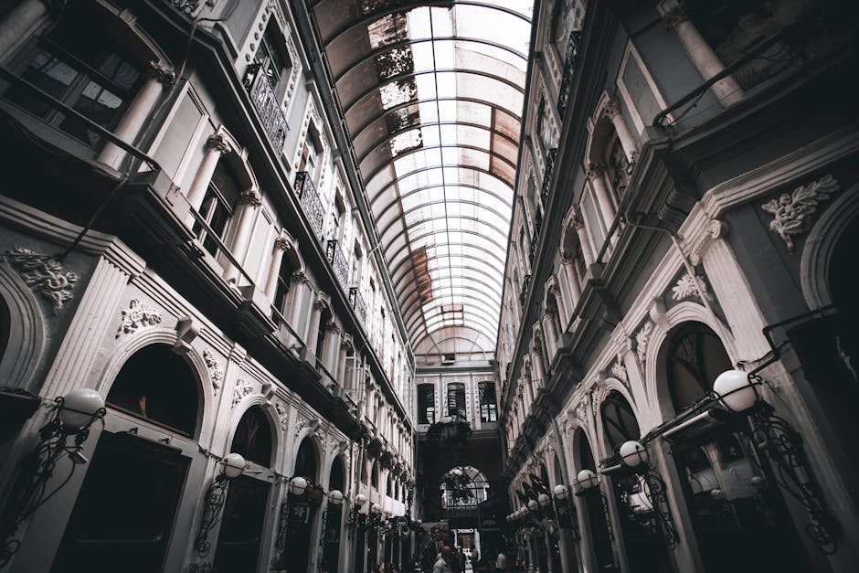 A striking view of a historic glass-roofed arcade in Istanbul, Turkey, showcasing intricate architecture.