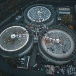 Drone shot of industrial tanks in Seattle highlights technology and engineering landscape.