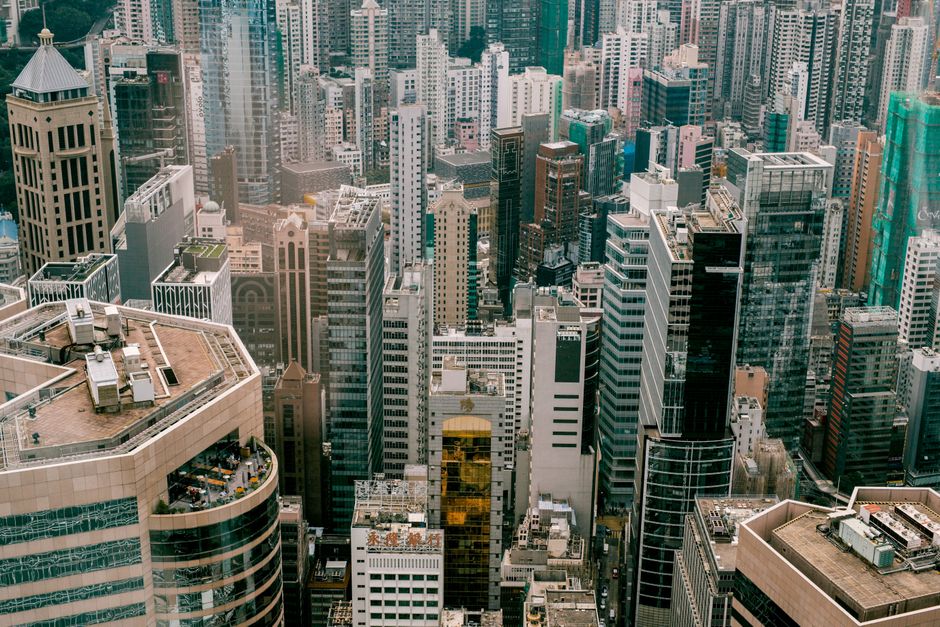 Breathtaking aerial view of Hong Kong's high-rise buildings and urban skyline.