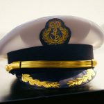 The Fragility of Modern Command: Why Tech Dependency Risks ROI Close-up of a captain's hat displaying intricate gold embroidery, symbolizing authority.