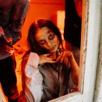 The Ghost Project: How Zombie Initiatives Drain Your Best Talent A haunting zombie emerges in a dimly lit room, evoking spine-chilling horror vibes.