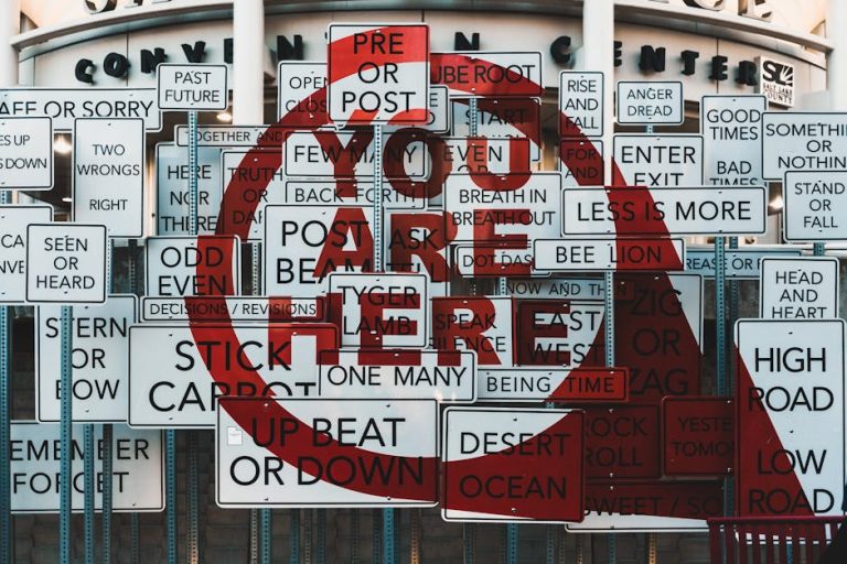 A creative collage of mixed message signs at the Salt Lake City Convention Center.