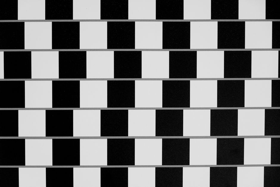 Abstract black and white checkerboard pattern, ideal for modern design and graphic projects.