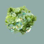 The Sustainability Paradox: Why AI-Driven Efficiency Can Lead to Dangerous Over-Consumption A digital abstract cube interwoven with lush greenery, symbolizing sustainability and technology.