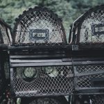 A moody scene of stacked lobster traps with netting, perfect for marine themes.