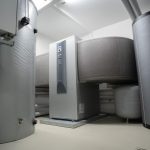 Thermal Energy Storage: Strategic Guide for Industrial Leaders Efficient and innovative heat pump system in an indoor setting for advanced heating solutions.