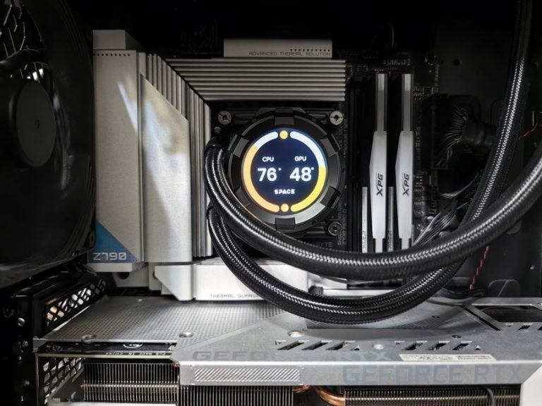 Close-up view of advanced PC hardware with visible GPU and cooling system in detail.