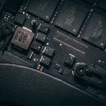 Why Your 'Modern' Tech Stack is Actually a Fragility Trap Detailed macro shot of electronic circuit board showing microchips and components.